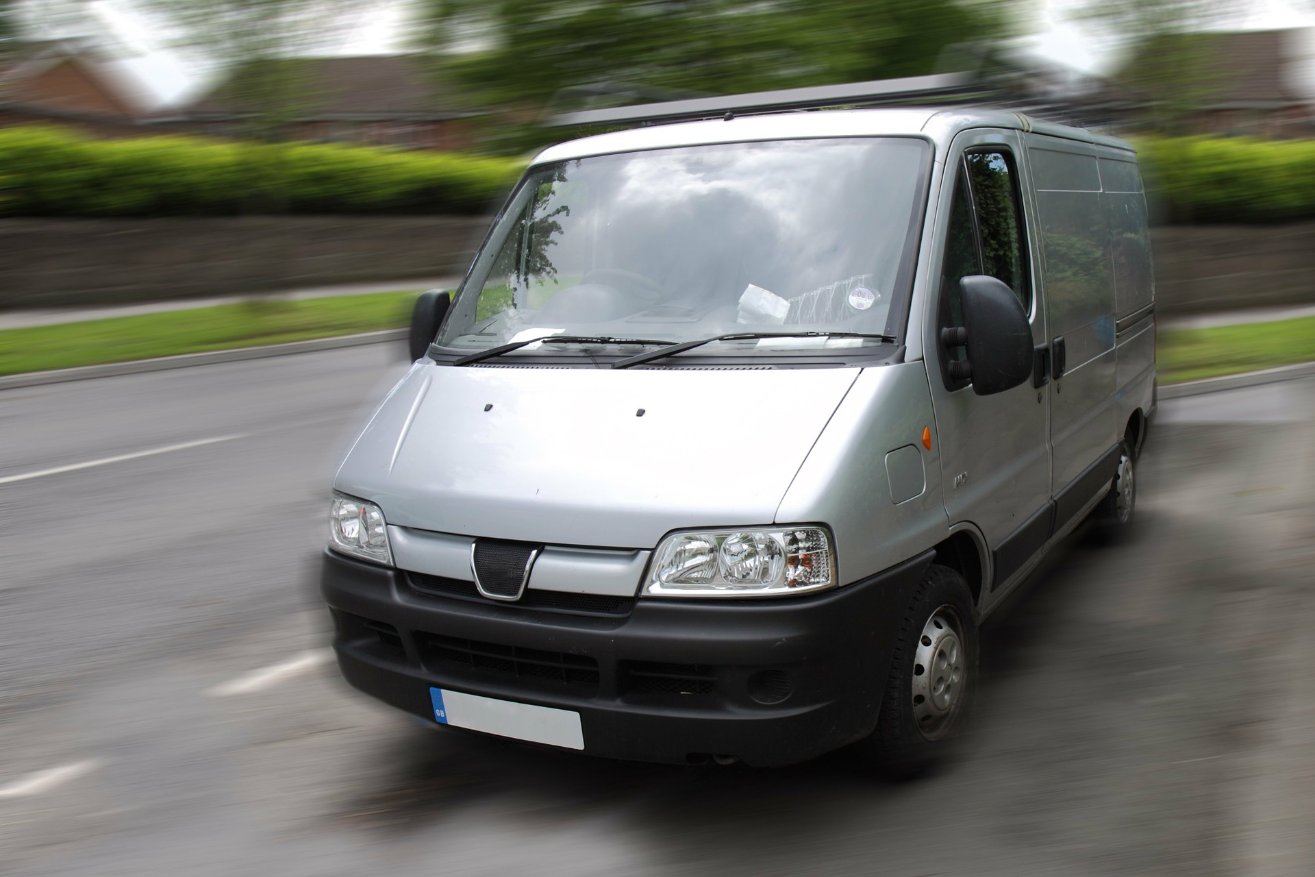 van driving down street