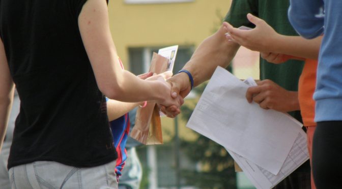 photo of two people shaking hands in agreement