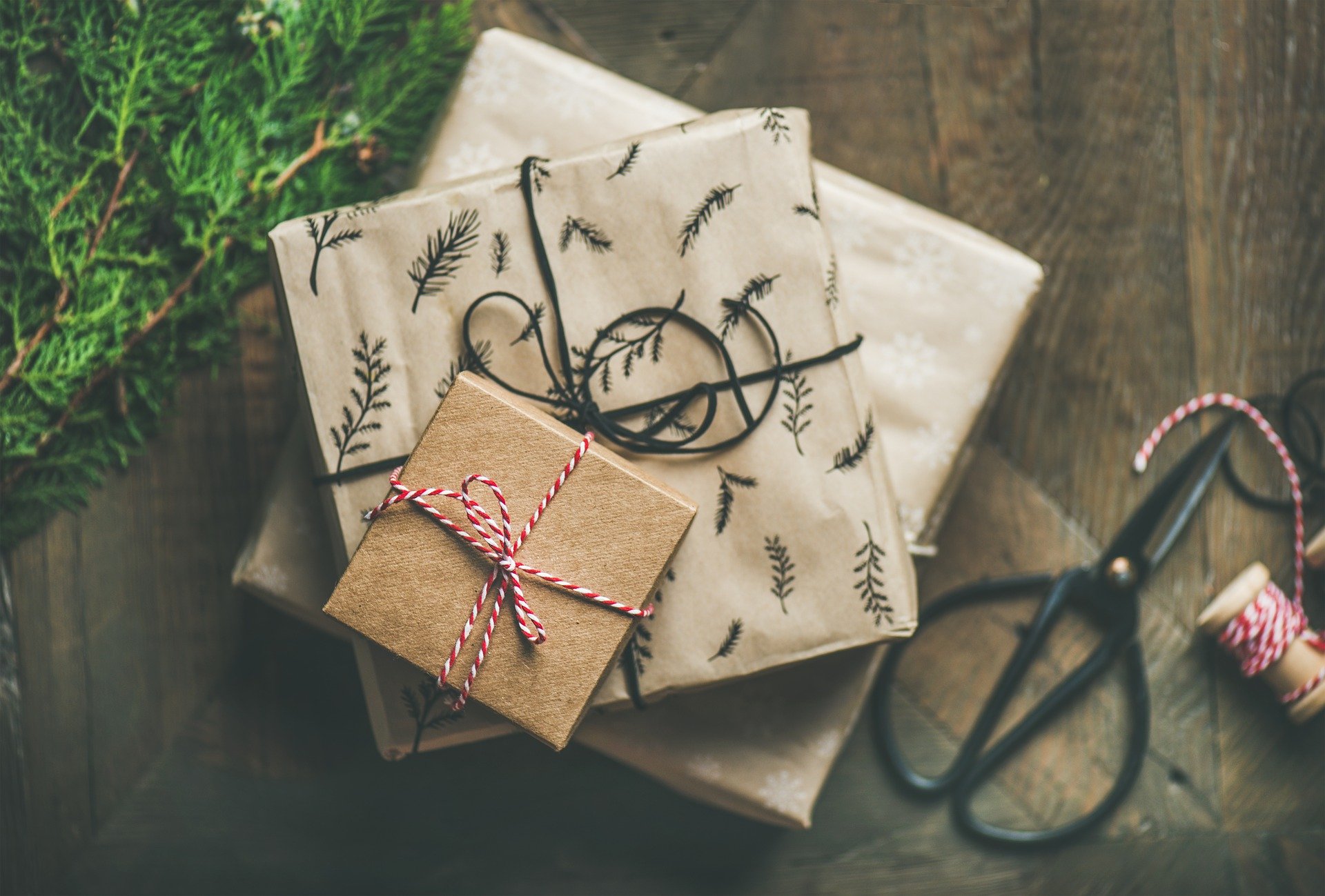 small pile of square presents wrapped in festive paper