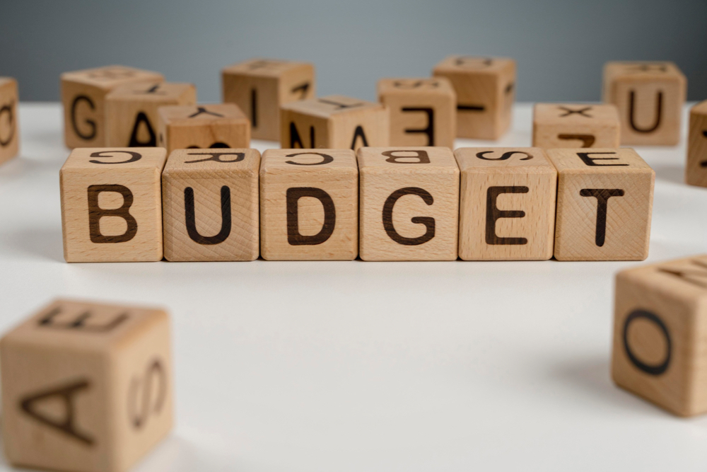 alphabet cubes spelling out the word budget